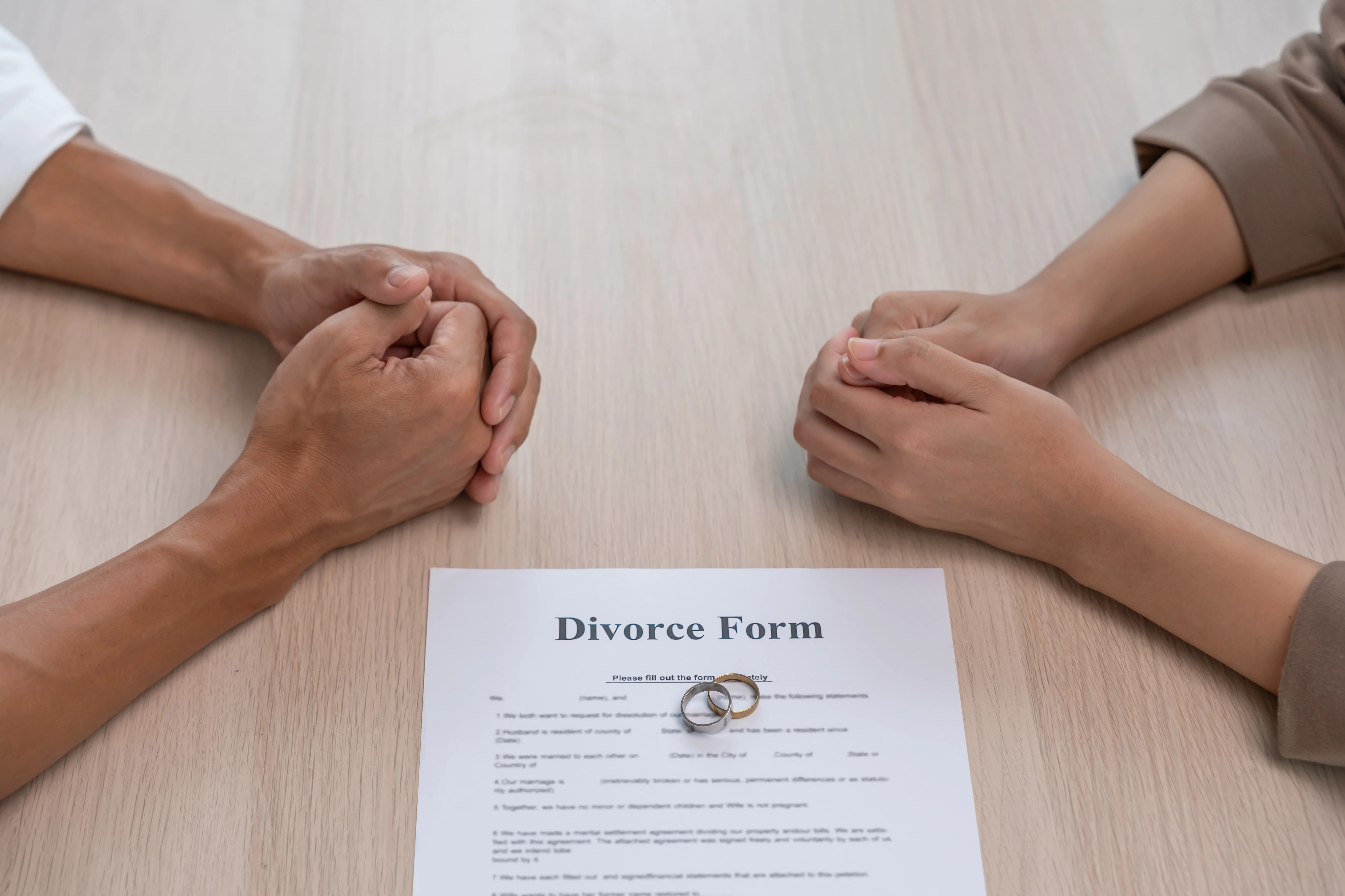 Couple reviewing divorce paperwork